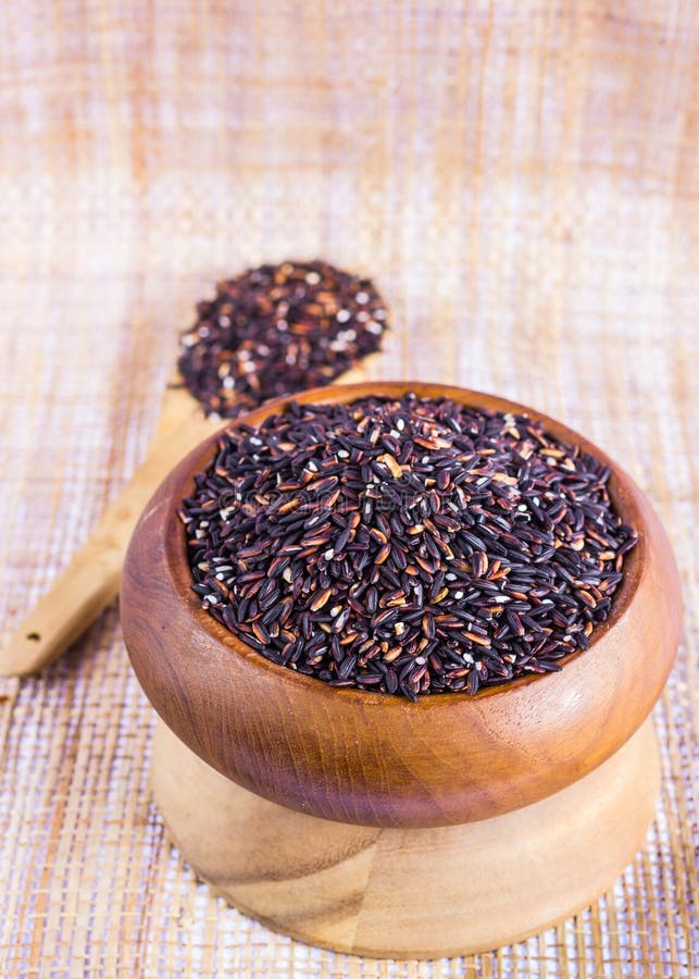 Thai Black Jasmine Rice (Rice Berry) In Wooden Bowl Stock Photo - Image ...