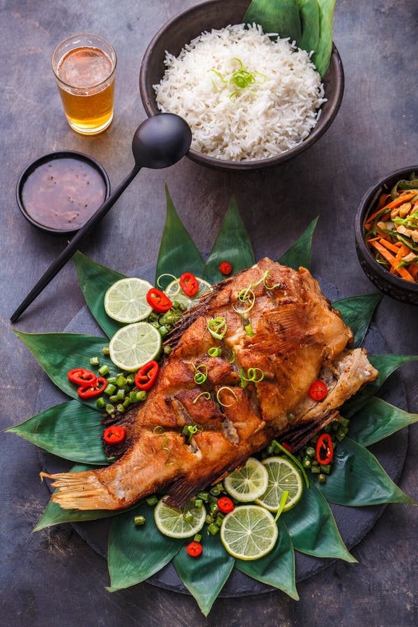 Thai Cuisine Deep Fried Fish with Salad and Rice, Top View Stock Photo