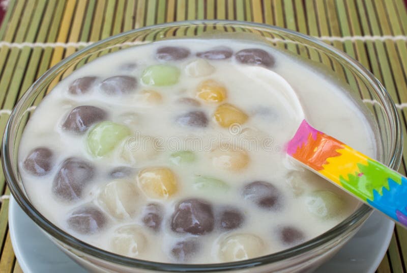 Thai sweetmeat with colorful ball flour, coconut, milk and egg : popular and famous thailand dessert called BUA LOI. Thai sweetmeat with colorful ball flour, coconut, milk and egg : popular and famous thailand dessert called BUA LOI