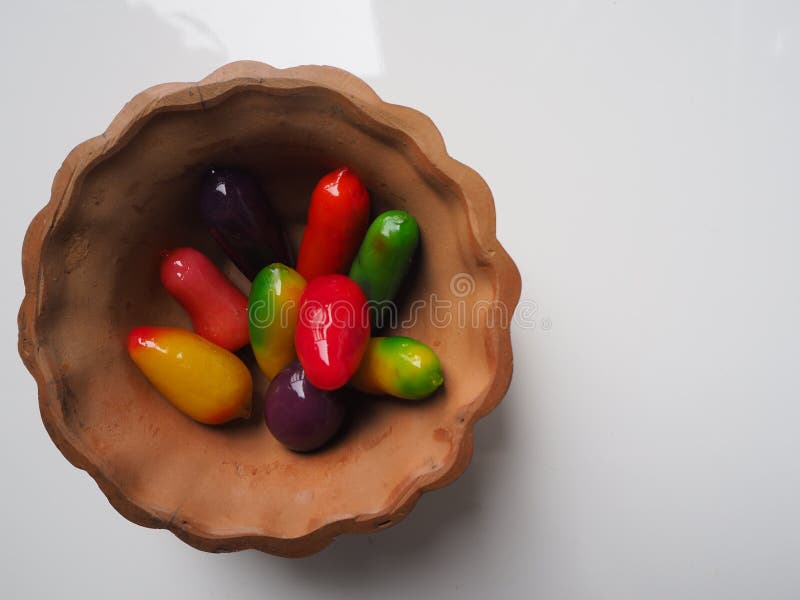 Thai Dessert, Thai Sweet, Ball plated desser in pottery cup on white background. Thai Dessert, Thai Sweet, Ball plated desser in pottery cup on white background.