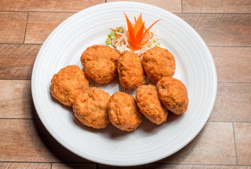 Thai Food Fried Shrimp Cake Tod Mun Kung on white plate stock photos Thai Food Fried Shrimp Cake Tod Mun Kung on white plate stock photos
