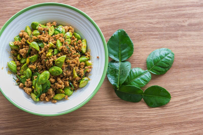 Thai food Stinking edible or Parkia speciosa fried with ground p stock photography Thai food Stinking edible or Parkia speciosa fried with ground p stock photography