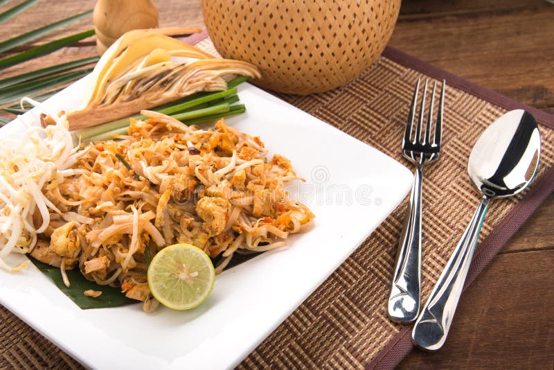 Thai Fried Noodles Pad Thai with shrimps or prawns.street food. fried noodles with chicken and shrimp royalty free stock image Thai Fried Noodles Pad Thai with shrimps or prawns.street food. fried noodles with chicken and shrimp royalty free stock image