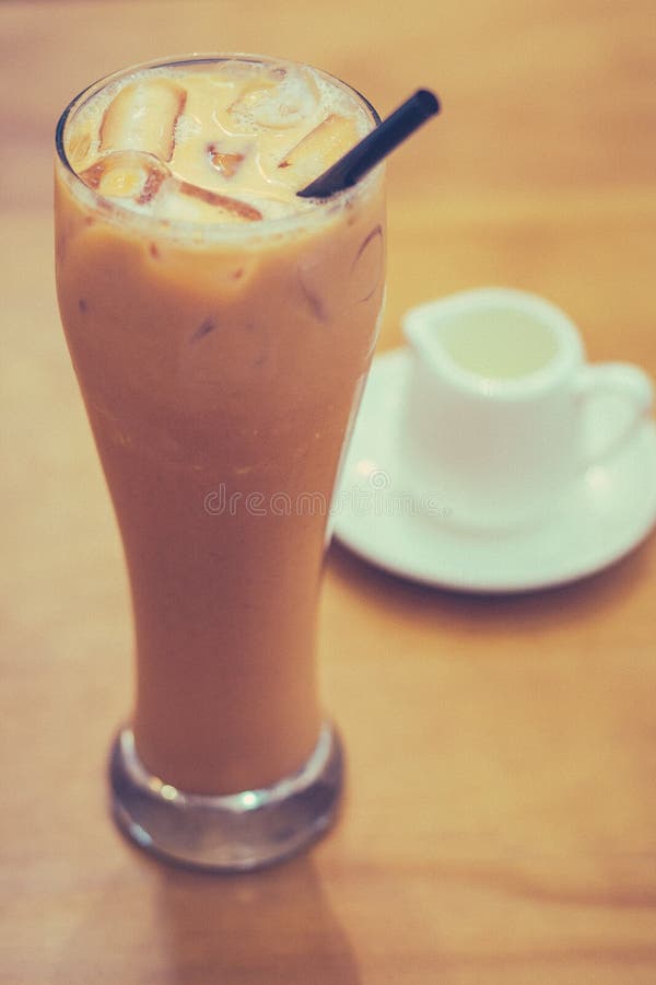 Thai Iced Milk Tea and Sugar Syrup on the Side Stock Image Image of