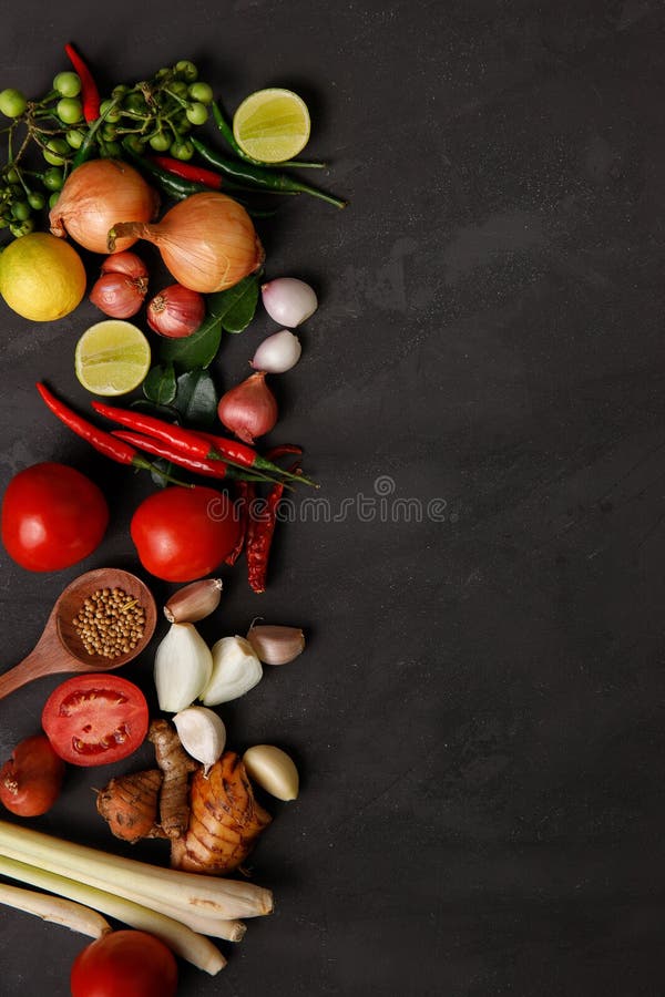Thai kitchen. Various herbs, spices  and Ingredients on dark background. Top view with copy space