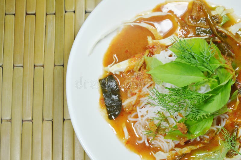 Thai Rice Noodles Dressing Curry with Fresh Vegetable on Plate Stock