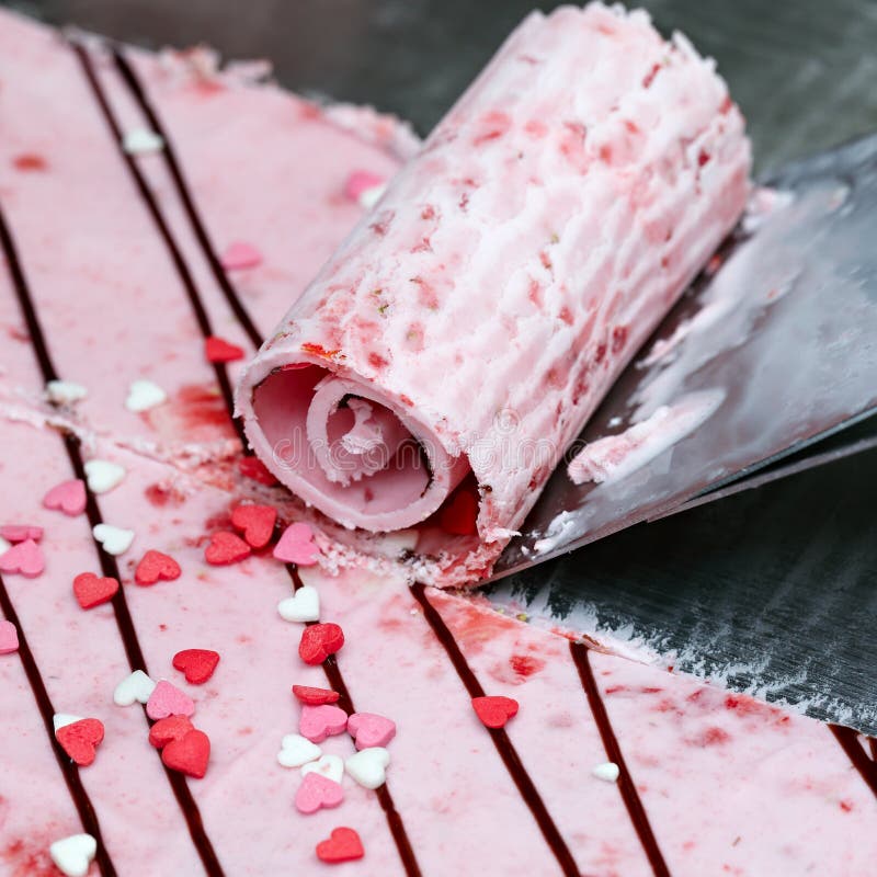 Thai roll ice cream is made by hand on the freezer. Sweet dessert made from natural berries and ingredients. The process. Of making food royalty free stock photos Thai roll ice cream is made by hand on the freezer. Sweet dessert made from natural berries and ingredients. The process. Of making food royalty free stock photos
