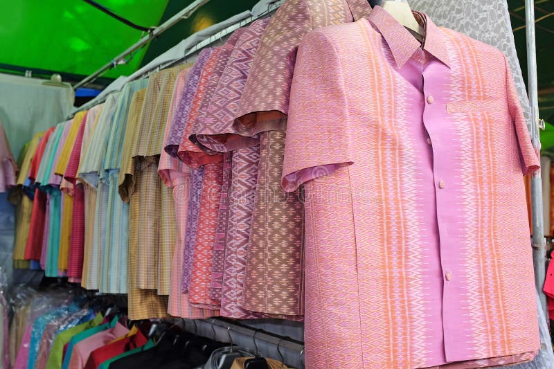 Thai silk suit hanging in shop.