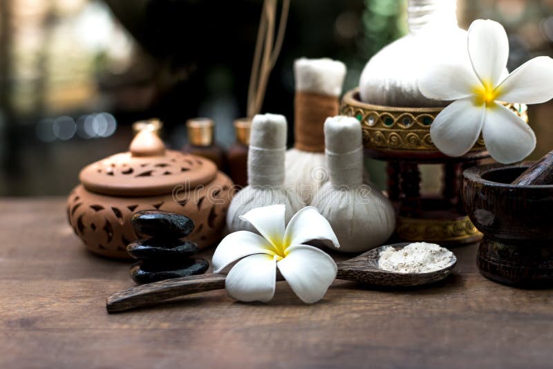 Thai Spa massage compress balls, herbal ball and treatment spa, relax and healthy care with flower, Thailand.