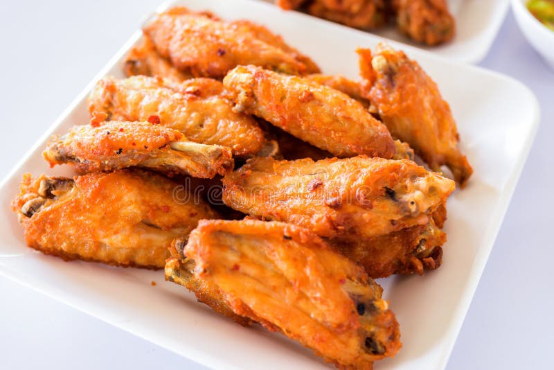Thai style homemade fried chicken wings on white plate stock images Thai style homemade fried chicken wings on white plate stock images