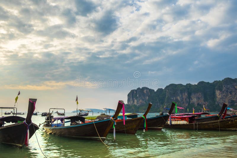 Thai traditional wooden longtail boats on Railay Beach in Krabi province. Thailand. royalty free stock photography Thai traditional wooden longtail boats on Railay Beach in Krabi province. Thailand. royalty free stock photography