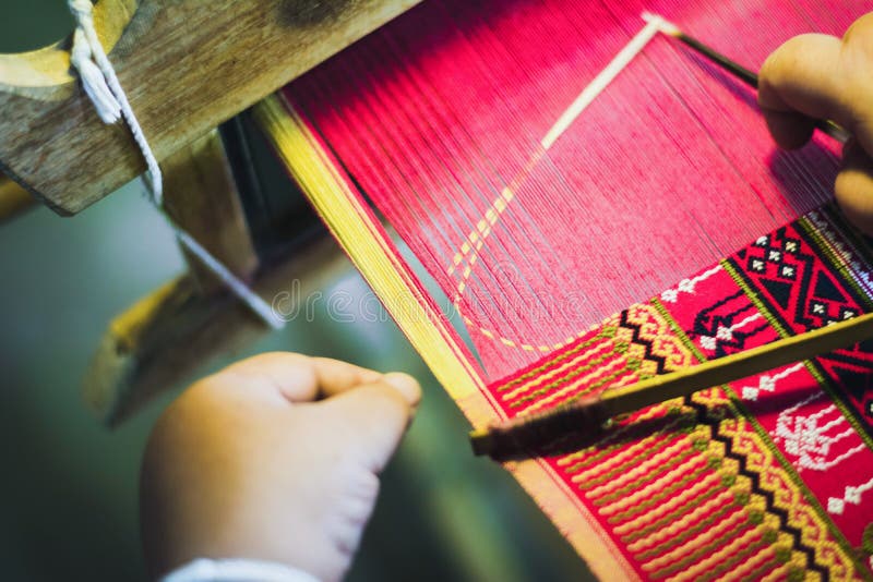 Thai woman making silk thread. stock images