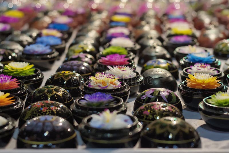 Thailand, Chiang Mai, soaps hand crafted with various flowers shapes for sale in a local market. Thailand, Chiang Mai, soaps hand crafted with various flowers shapes for sale in a local market