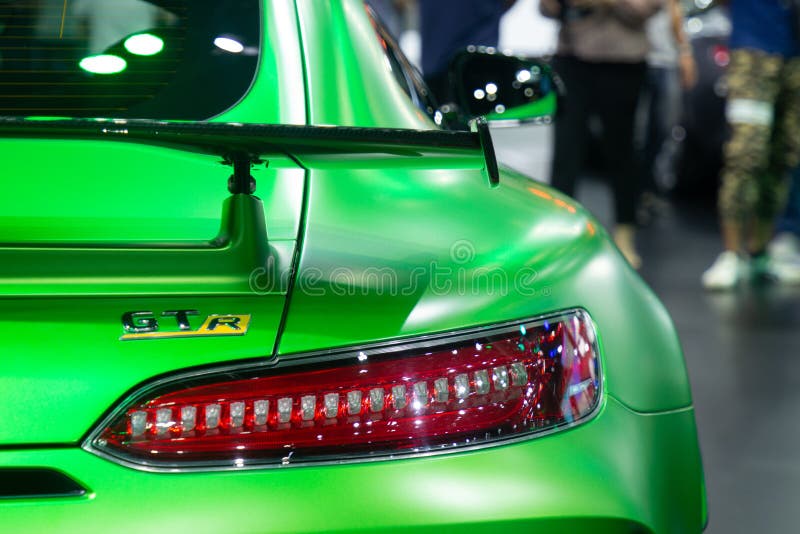 Thailand - December, 2018: Bil f?r sport f?r gr?n f?rg f?r serie f?r Mercedes benz AMG GTR lyxig i motorshow bilslut f?r bakre si fotografering för bildbyråer Thailand - December, 2018: Bil f?r sport f?r gr?n f?rg f?r serie f?r Mercedes benz AMG GTR lyxig i motorshow bilslut f?r bakre si fotografering för bildbyråer