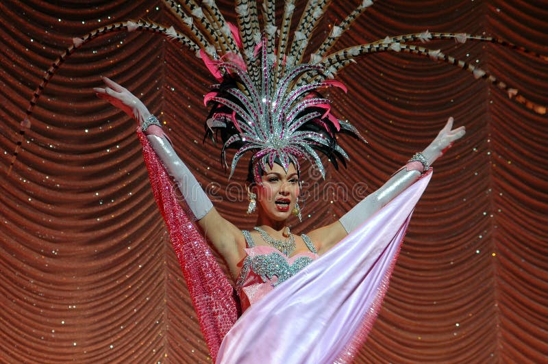 One of the fabled showgirl lady boy performers sings during one of the spectacular shows at the famous Alcazar Theatre in Pattaya, Thailand. One of the fabled showgirl lady boy performers sings during one of the spectacular shows at the famous Alcazar Theatre in Pattaya, Thailand.