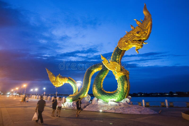 A Phayanak or Naga Statue at the mekong river in the town of Nong Khai in Isan in north east Thailand. A Phayanak or Naga Statue at the mekong river in the town of Nong Khai in Isan in north east Thailand
