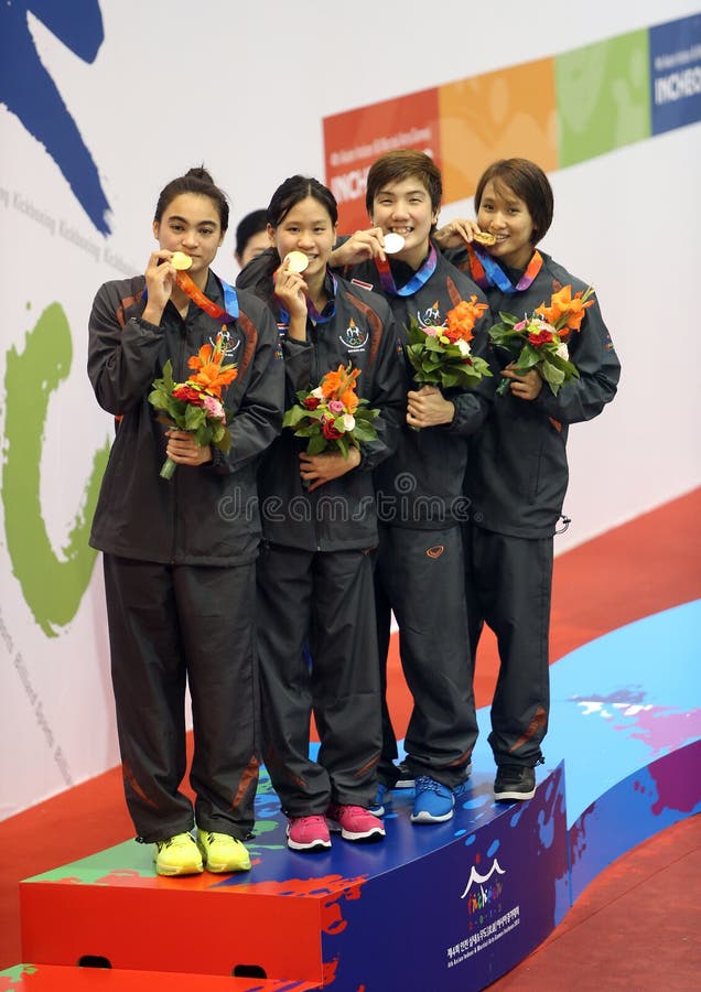 Incheon - July 2:Thailand's Women's 4x50m Freestyle team with gold medal in an Asian Indoor and Martial Arts Games 2013 at Dowon Aquatics Center on July 2, 2013 in Incheon, South Korea.