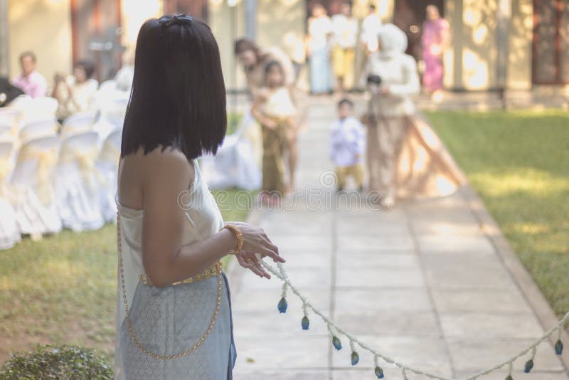 Thailändische traditionelle Hochzeitszeremonie Außer dem Bräutigam von Approa lizenzfreie stockfotografie Thailändische traditionelle Hochzeitszeremonie Außer dem Bräutigam von Approa lizenzfreie stockfotografie