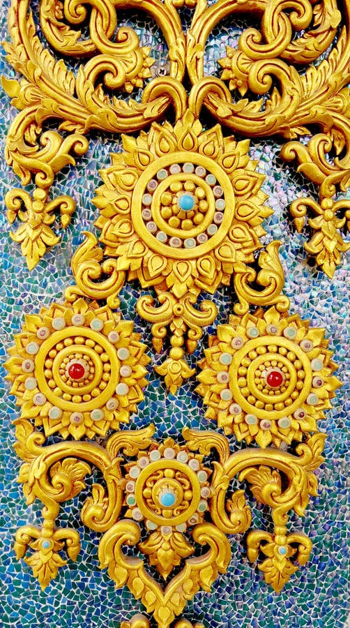 Traditional thai style with floral stucco texture on coloful ceramic wall at temple in Thailand. Traditional thai style with floral stucco texture on coloful ceramic wall at temple in Thailand