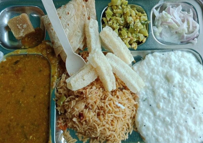 Thali, South Indian Food for Lunch, Veg Fried and Curd Rice. Stock