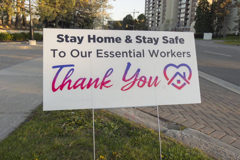 Thank you front line, essential workers & volunteers sign in front of a house during corona virus pandemic outbreak stock photos