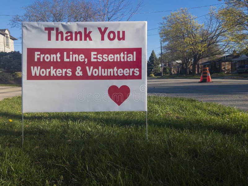 Thank you front line, essential workers & volunteers sign in front of a house during corona virus pandemic outbreak stock image