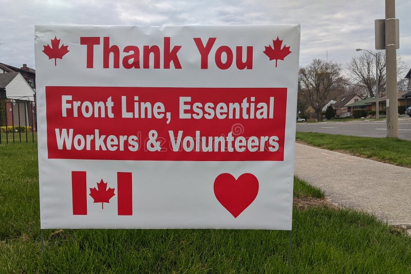 Thank you front line, essential workers & volunteers sign in front of a house during corona virus pandemic outbreak stock image