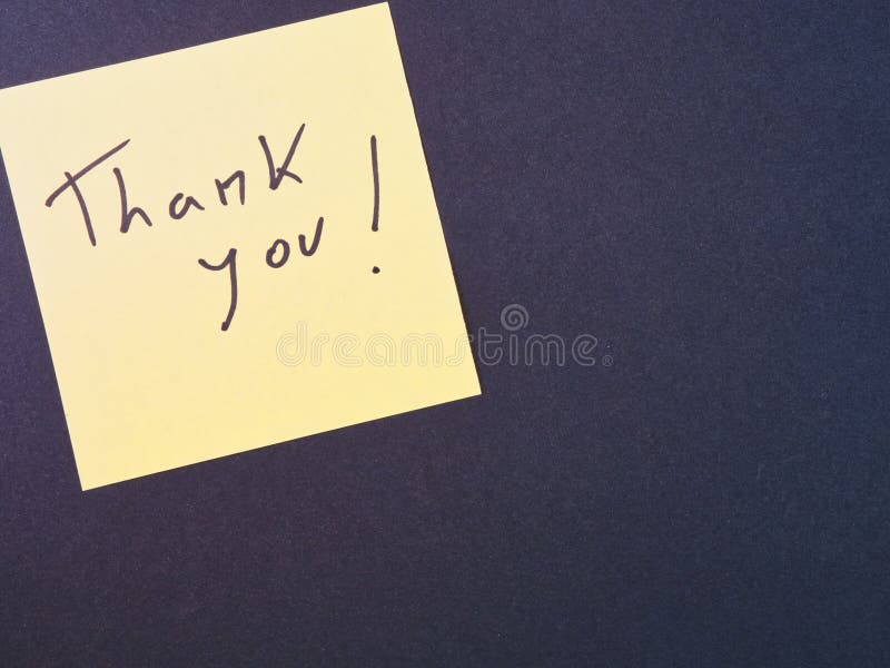 Thank You Sticky Note on Dark Background royalty free stock photography
