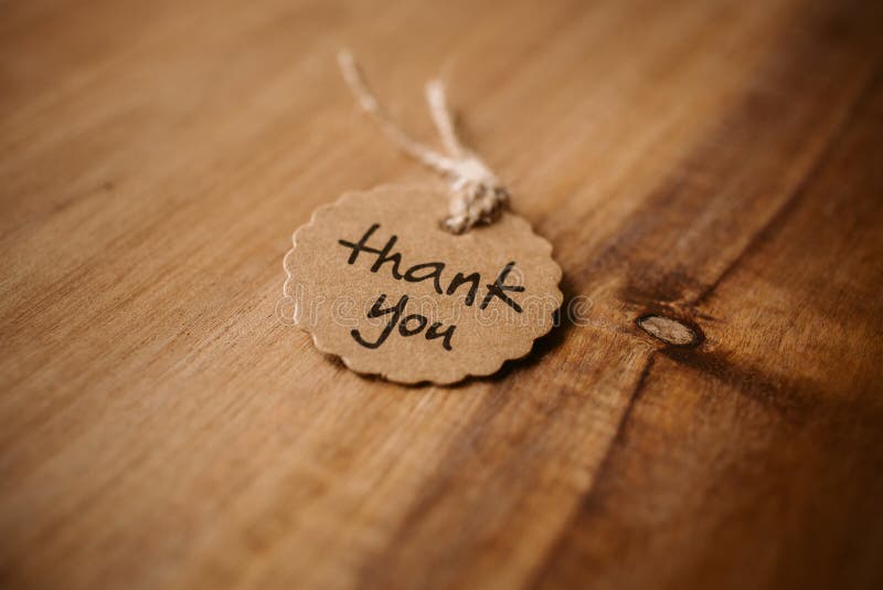 Thank You Word Written in a Card on Wooden Background. Love and ...