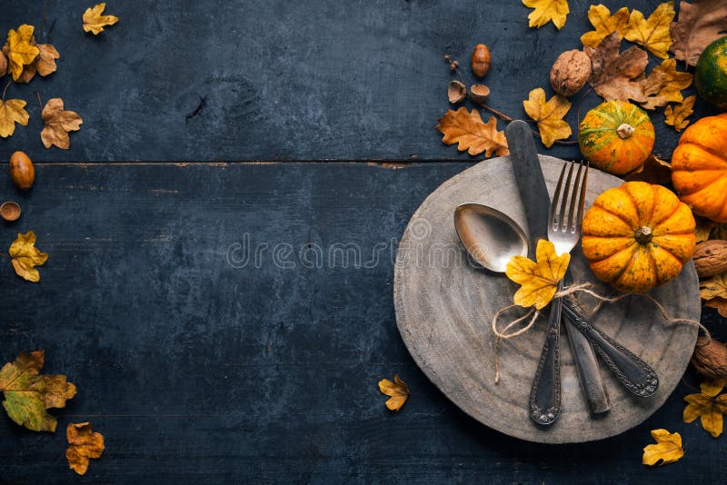 Thanksgiving Background with Cutlery, Pumpkins and Dry Leaves Stock ...