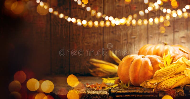 Thanksgiving Day. Autumn Thanksgiving pumpkins over wooden background