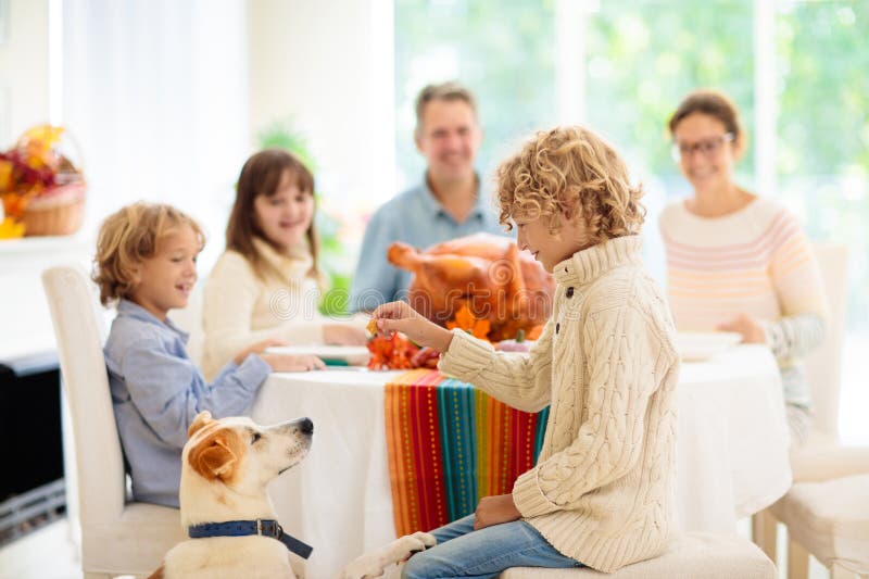 Family with Kids at Thanksgiving Dinner. Turkey Stock Image - Image of ...