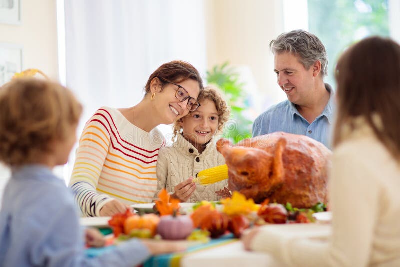 Family with Kids at Thanksgiving Dinner. Turkey Stock Image - Image of ...