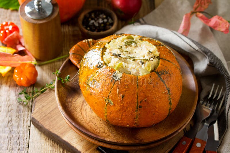 Thanksgiving Turkey Dinner. Baked Pumpkin Stuffed with Turkey, Rice and ...