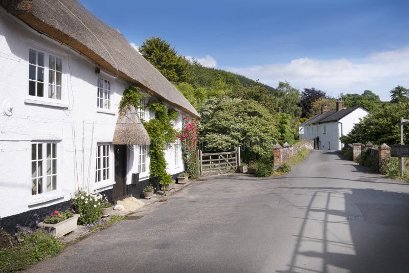 Thatched cottage on village street in Sidbury, Devon, UK