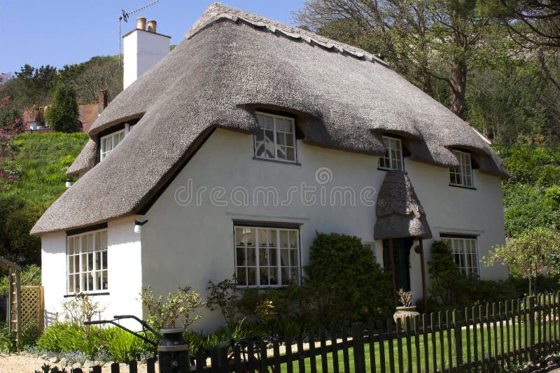 Thatched white cottage