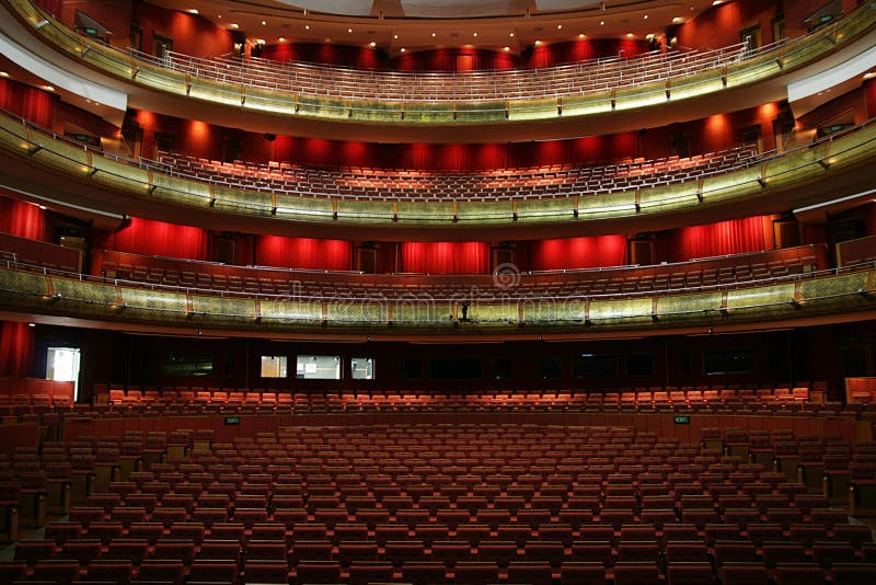 View of a venue in a theater with red seat. View of a venue in a theater with red seat