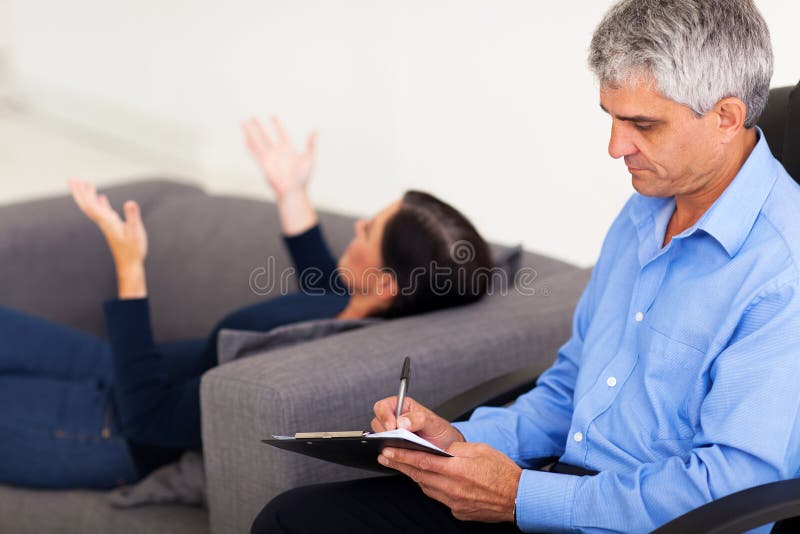 Therapist consulting patient stock photos Therapist consulting patient stock photos