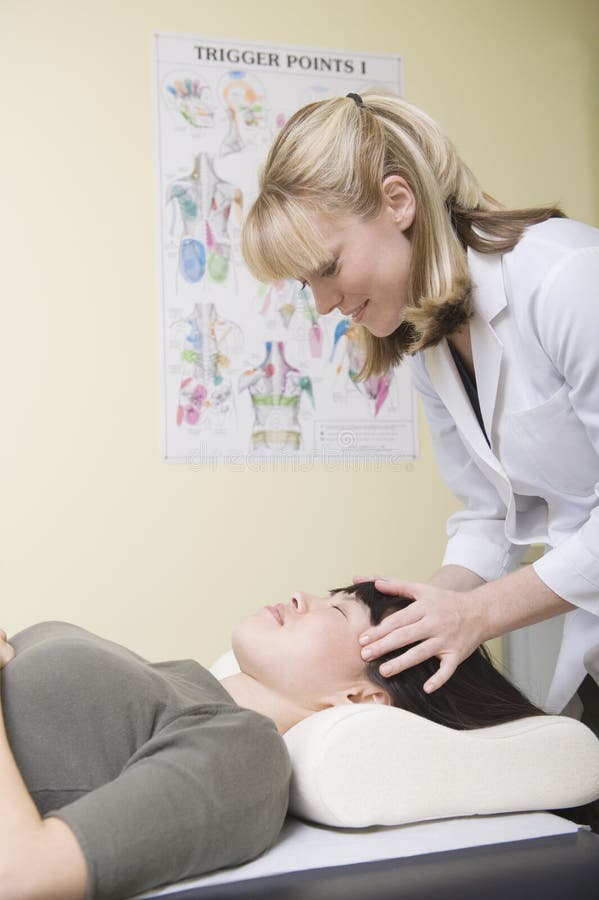 Man Giving Head Massage To Hi