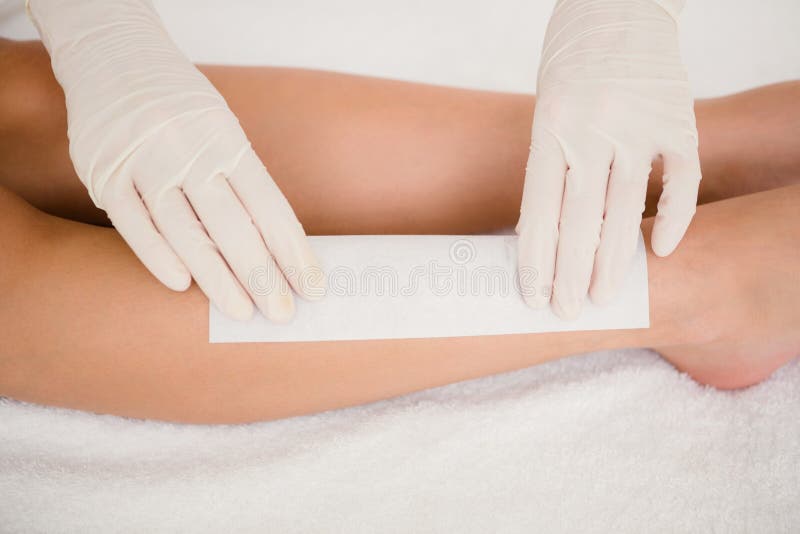 Therapist Waxing Womans Leg At Spa Center Stock Image Image of