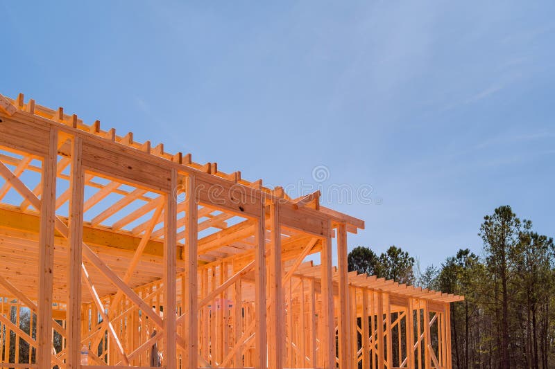 There are Beams of Wood Stick Framing To Framework New House in the