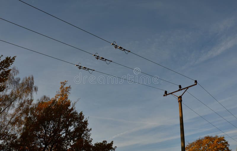 There are circuit breaker terminals on the high voltage wires. he can easily disconnect part of the lines and cut off part of the royalty free stock image