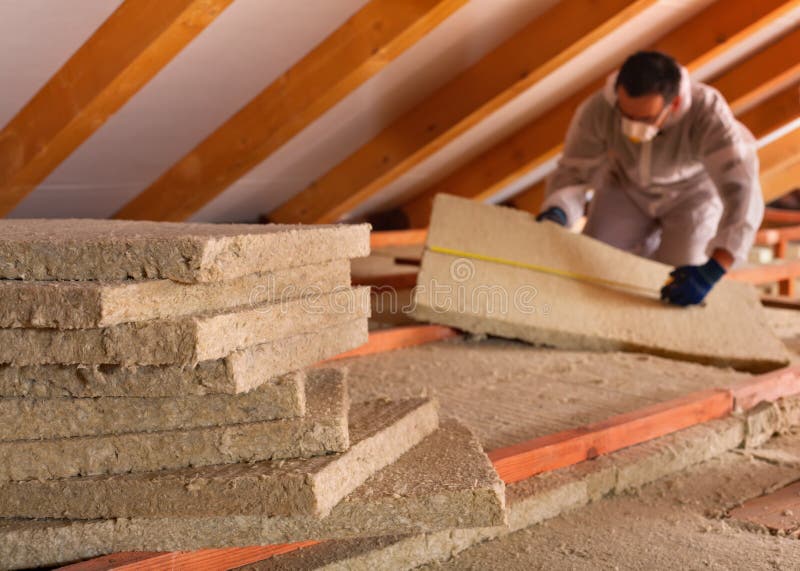 Thermal insulation of a building with mineral wool panels royalty free stock photography Thermal insulation of a building with mineral wool panels royalty free stock photography