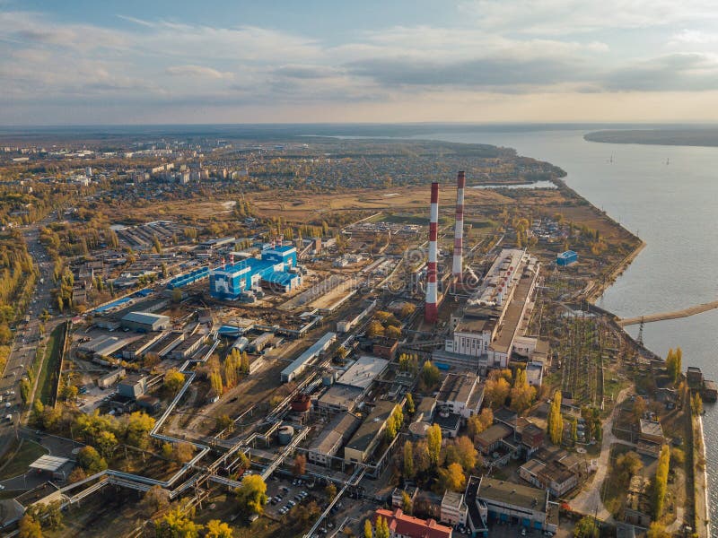 Thermal power plant. Aerial view from drone of large industrial area on shore of Voronezh water reservoir stock photo Thermal power plant. Aerial view from drone of large industrial area on shore of Voronezh water reservoir stock photo