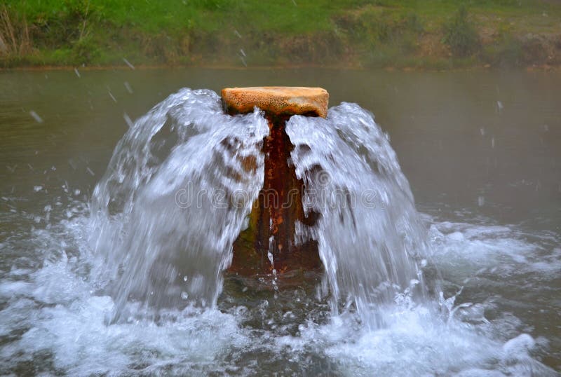 Thermal spring fountain in a pond