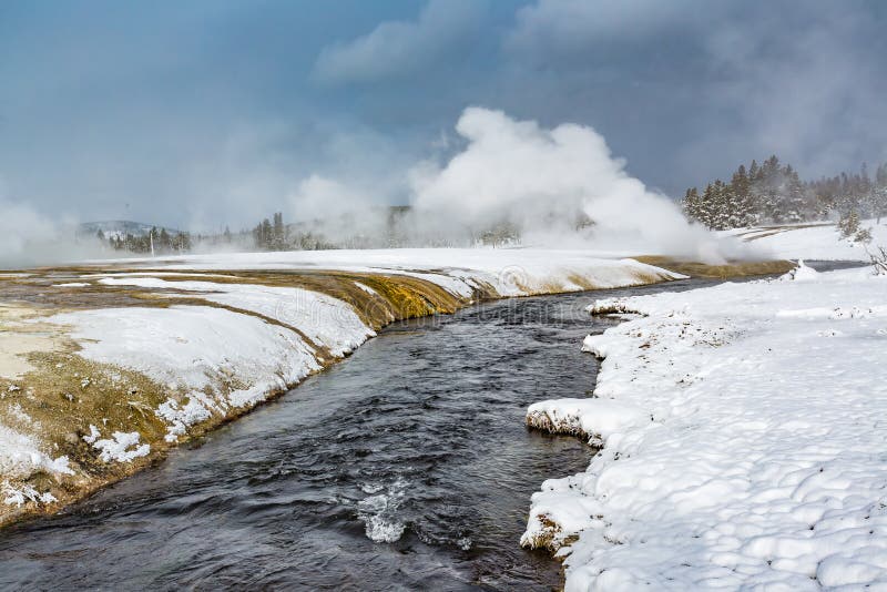 Thermal Steam Rises From Hot Water In Yellowstone In Winter Stock Image