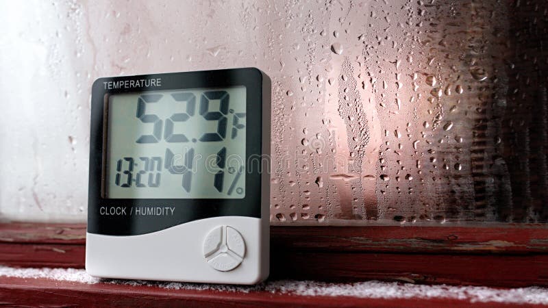 Thermometer and hygrometer of electronic to control temperature and humidity. Humidity indicator is indicated on the hygrometer of stock image
