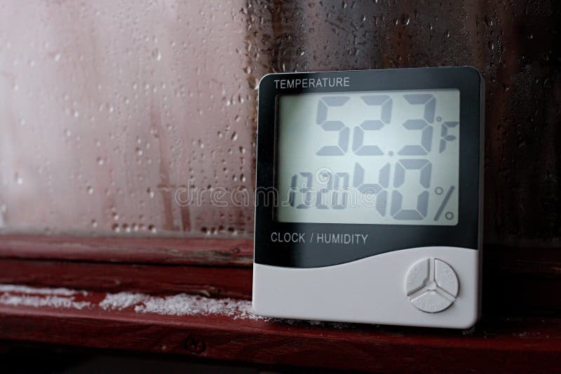 Thermometer and hygrometer of electronic to control temperature and humidity. Humidity indicator is indicated on the hygrometer of stock photo