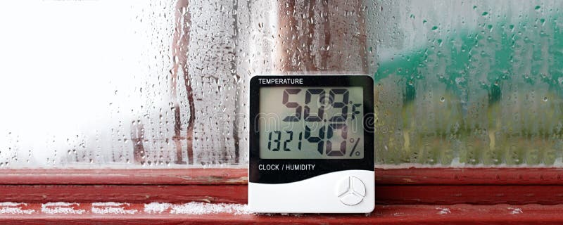 Thermometer and hygrometer of electronic to control temperature and humidity. Humidity indicator is indicated on the hygrometer of stock photo