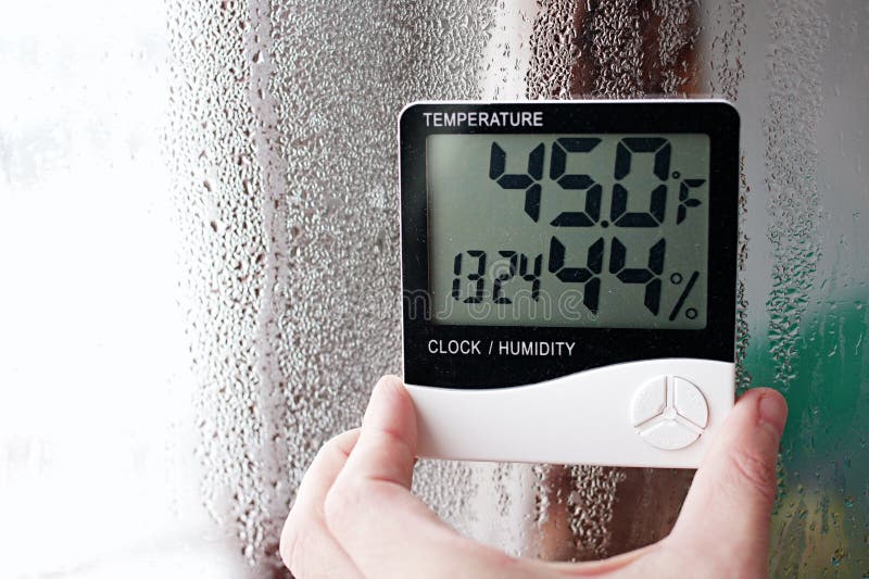 Thermometer and hygrometer of electronic to control temperature and humidity. Humidity indicator is indicated on the hygrometer of stock photos